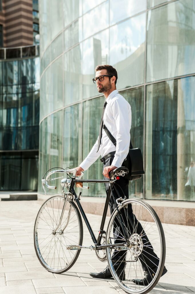 Businessman with bicycle.