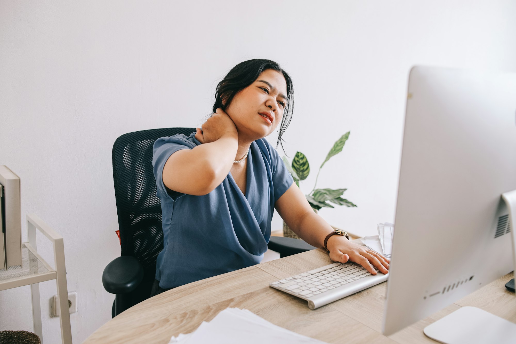 Businesswoman Suffer From Neck Pain